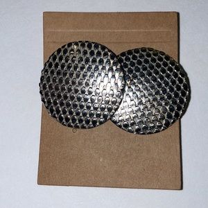 Vintage stainless round clip on earrings.